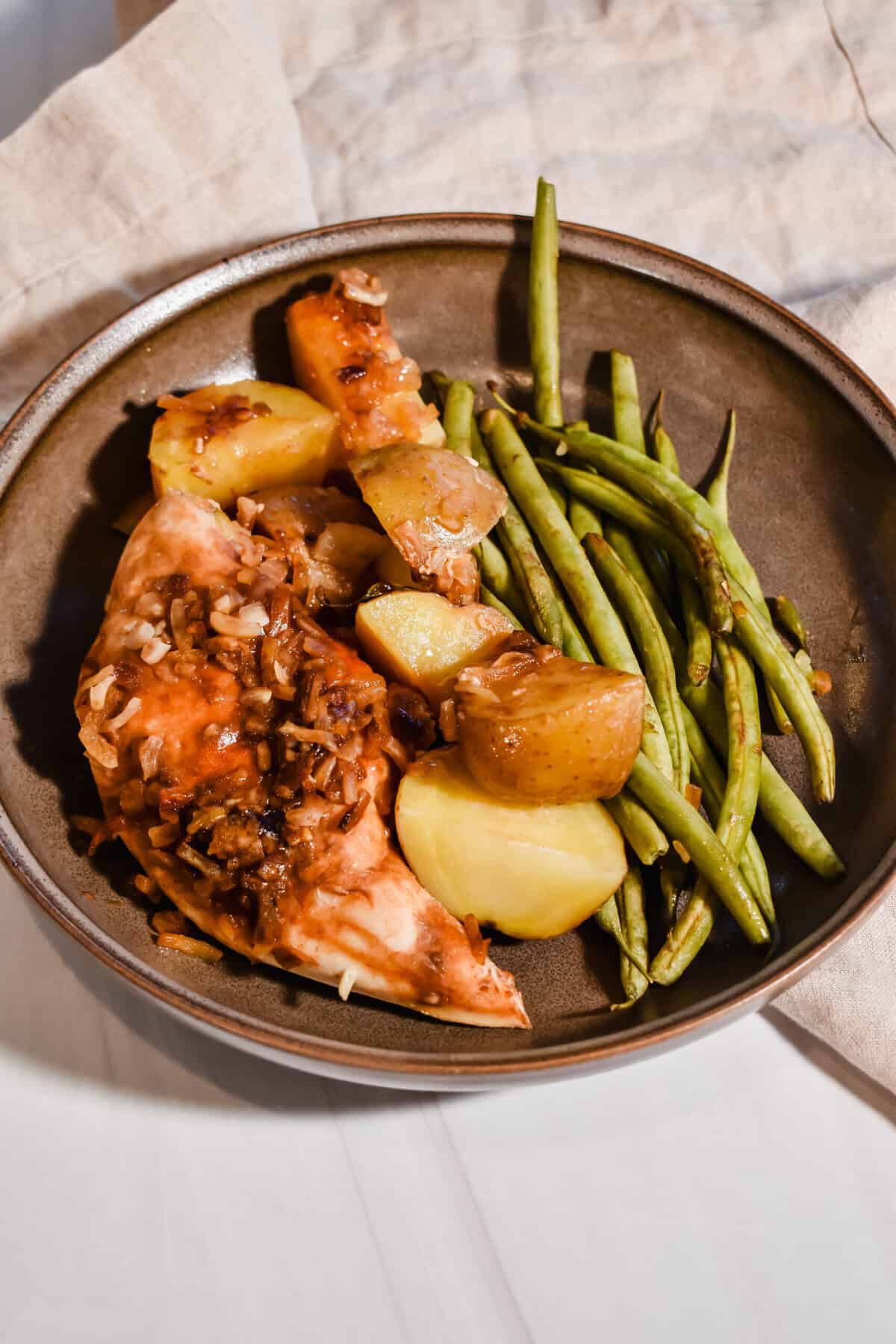 This is a close up overview of my 5 ingredient crockpot chicken, potatoes and green beans.